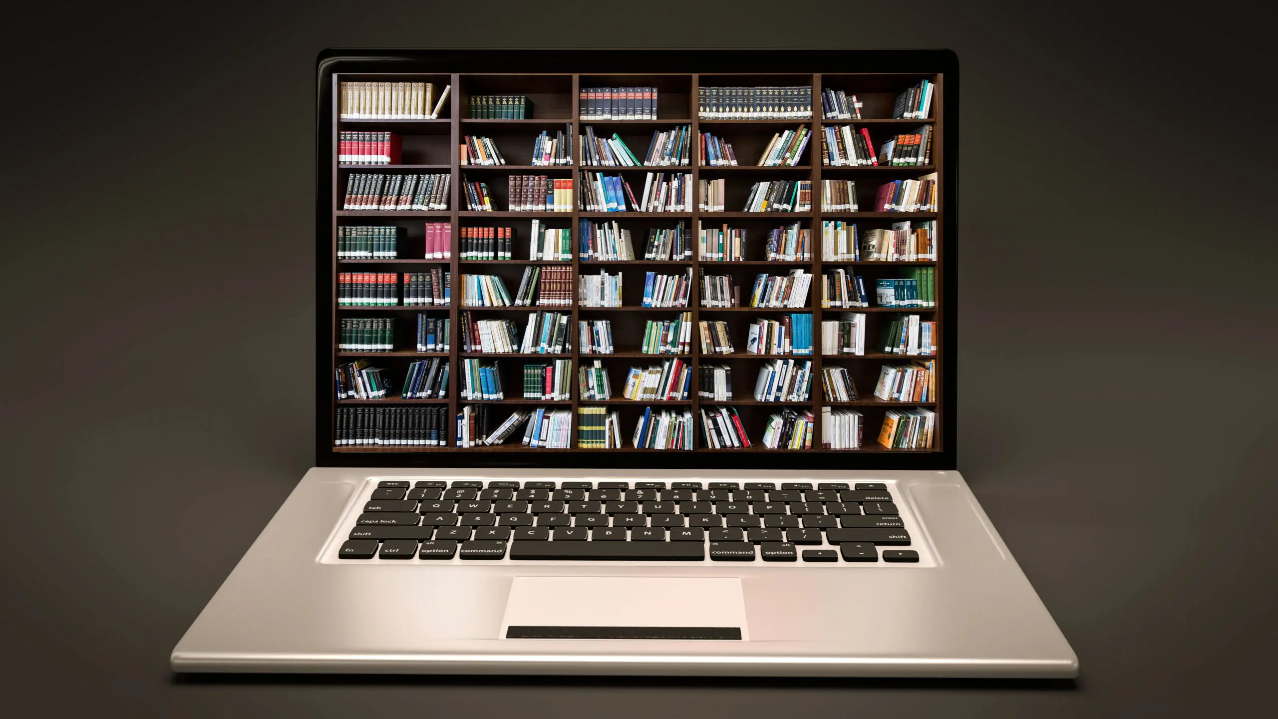 Laptop displaying a virtual bookshelf. DEPARTMENT OF PUBLISHING