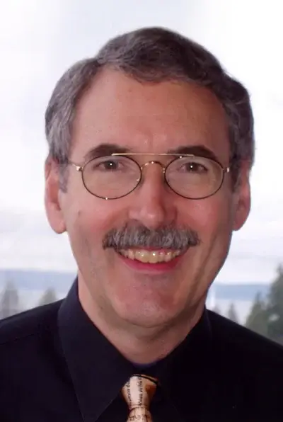 Portrait of Dr. Philip B. Payne, Director of Godhunting Resources